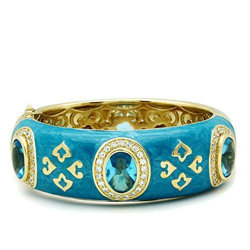 JCE2250 Gold Brass Bangle with Synthetic Synthetic Glass in Sea Blue